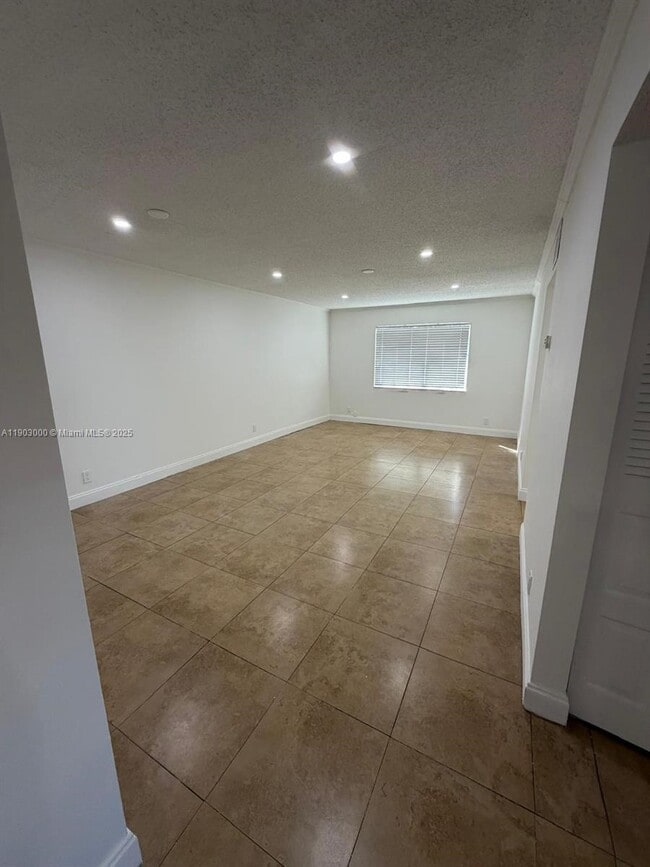 Building Photo - 10701 Royal Palm Blvd