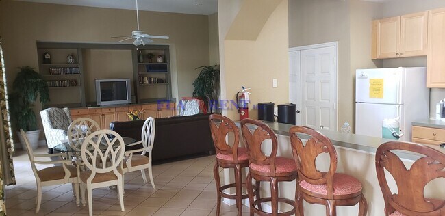 Foto del edificio - 4 BR / 3 FULL BATH (INCLUDES 2 MASTERS) 2 STORY (NEAR DISNEY!) GATED COMMUNITY WITH COMMUNITY POO...