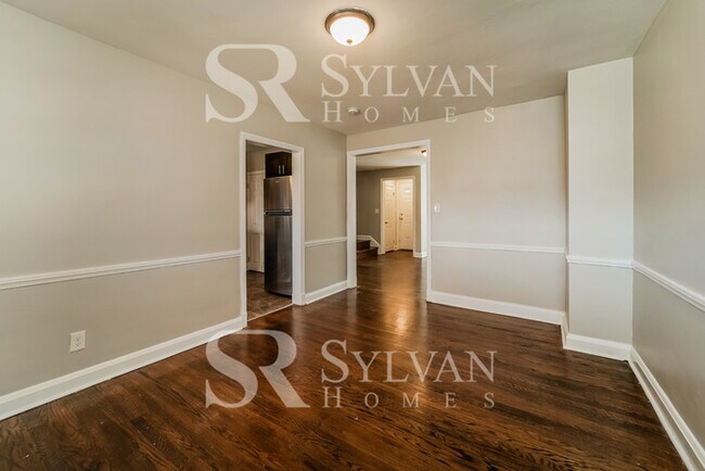 Building Photo - The living is easy in this 4 bedroom, 2 ba...