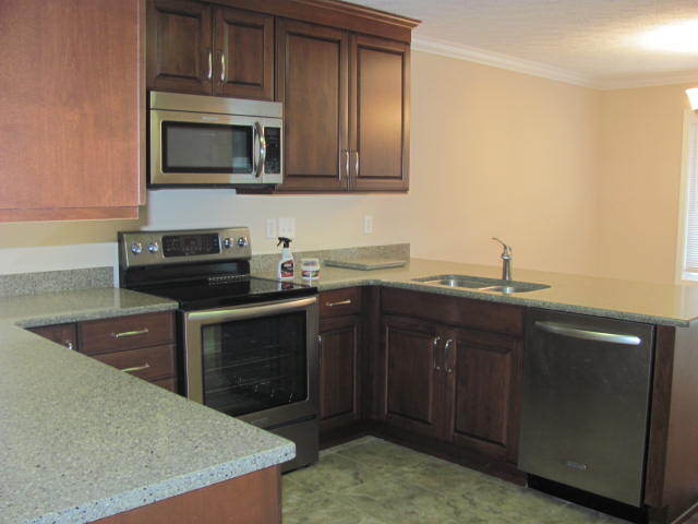 Kitchen with dishwasher, microwave, oven, and fridge/freezer - 2243 Whitney Ct