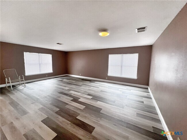 Building Photo - 7338 Raintree Forest