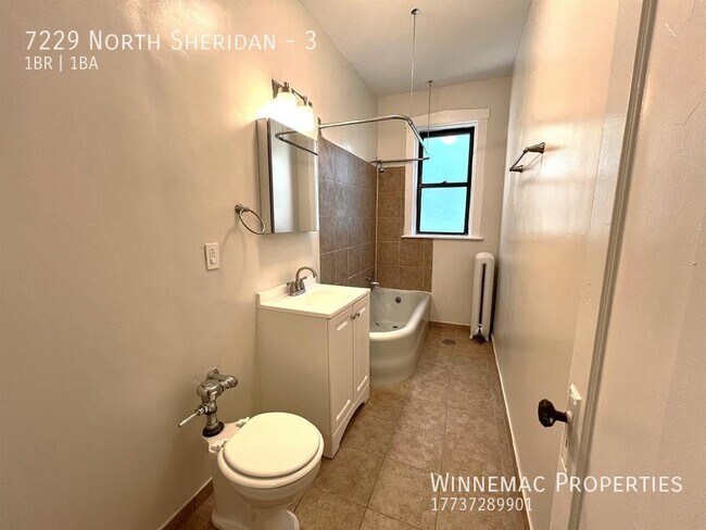 Building Photo - 7229 North Sheridan-3