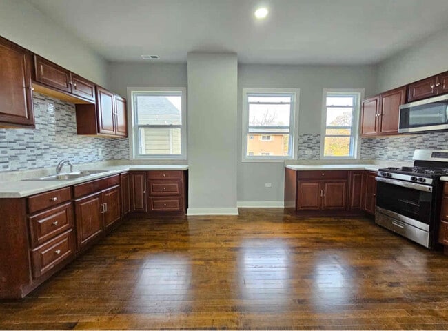 Photo - 121 N Menard Ave Apartment