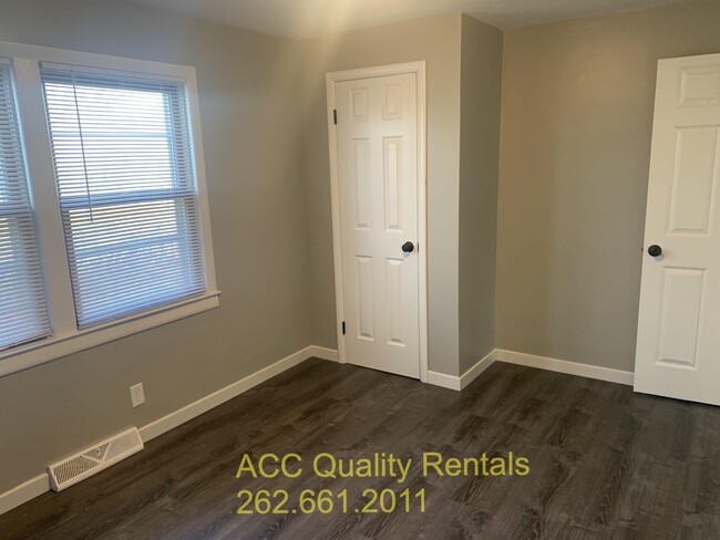 master bedroom with closet. Approx. room size: 13.5' x 9.5’ - 1398 N Rd