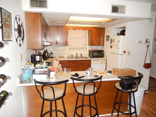 Building Photo - SPACIOUS 1/1 with Deck, Plank Floors, Vaul...