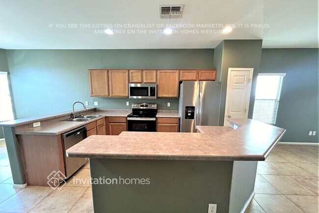 Building Photo - 14611 W Acapulco Ln