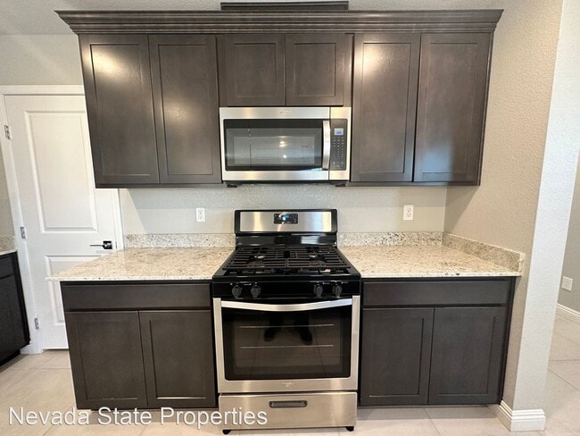 Building Photo - 4 br, 3 bath House - 6972 Caldera St