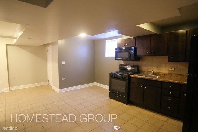 Foto del edificio - 4708 N Lowell Ave