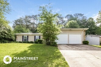 Building Photo - 8560 Glenwoods Dr