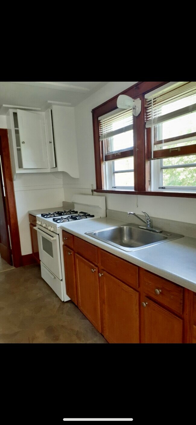 kitchen w/ freshly stained cabinets - 122 Saratoga Ave