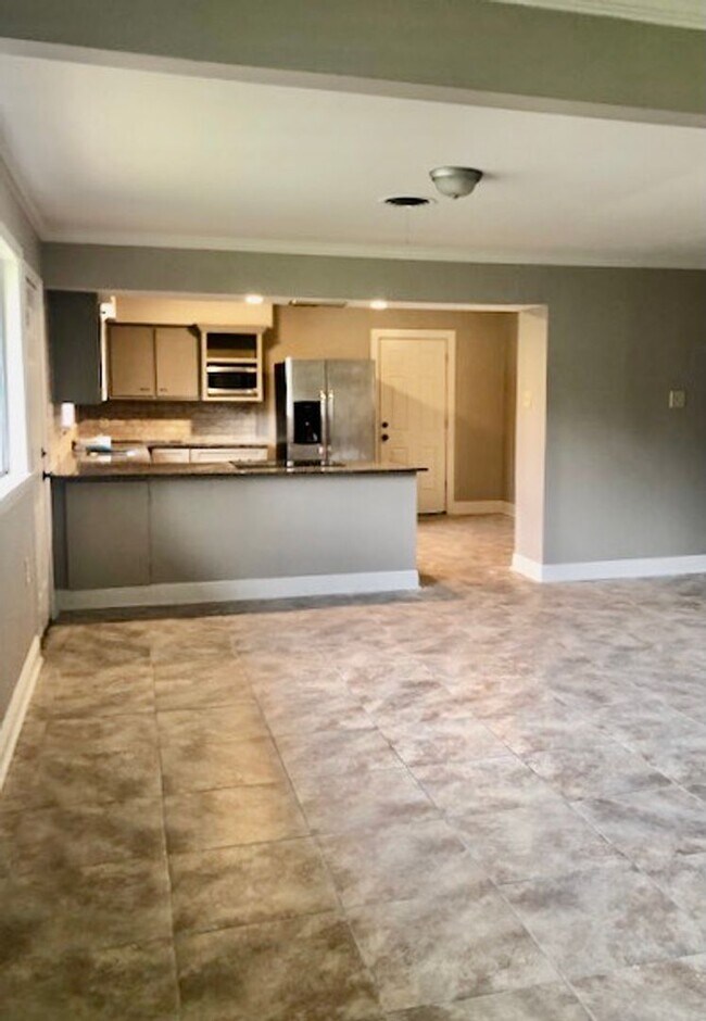 Building Photo - Location! Just updated! open kitchen,slab ...