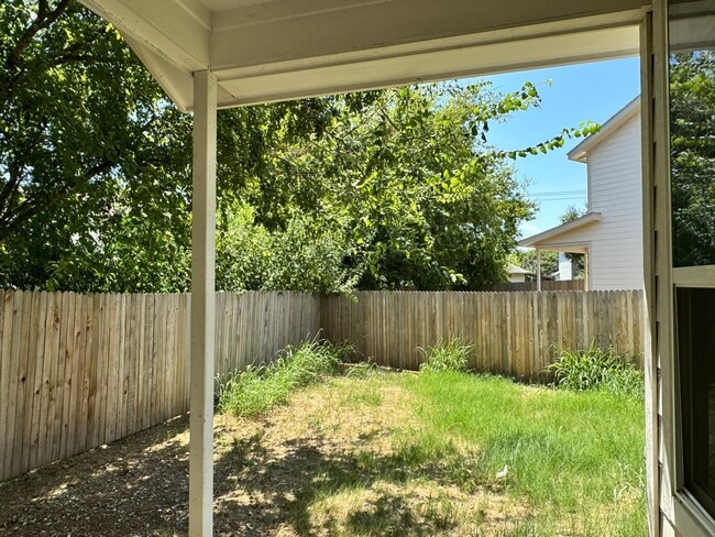 Building Photo - Move Fast! Gated Townhome Near Lackland AFB with Private Yard & EV-Ready Garage