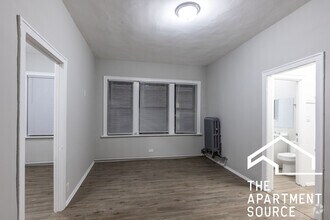 Building Photo - 5451 S Cornell Ave