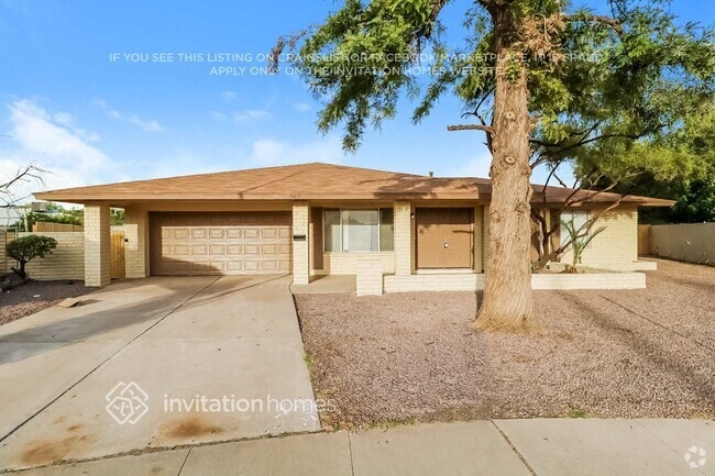 Building Photo - 9417 N 39th Dr