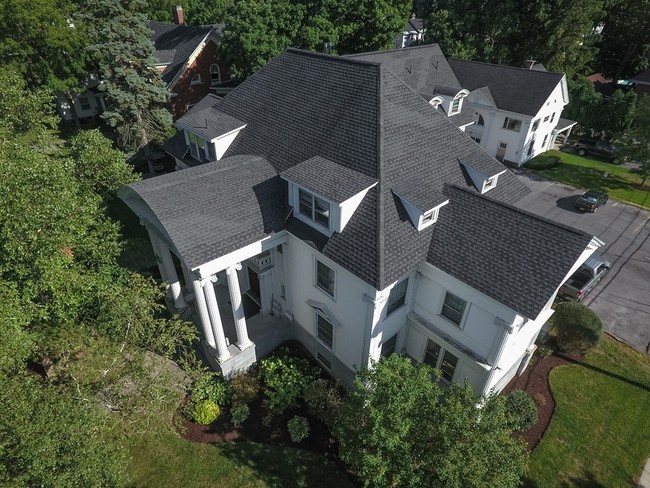 Main building has 13 units, Carriage house in back has 3 units, but could be converted to single fam - The Carlisle