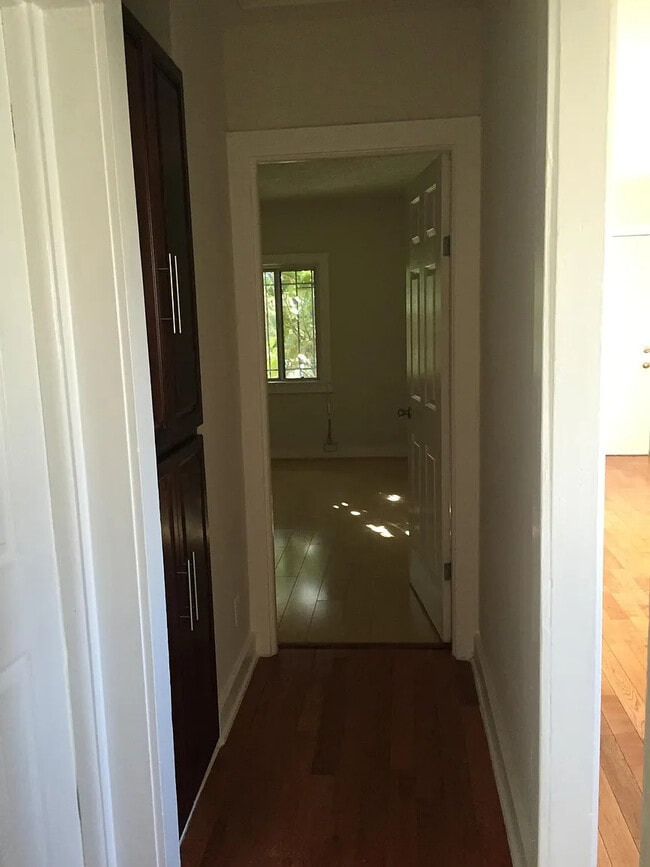 Hallway separates bedrooms for privacy - 1680 S Longwood Ave