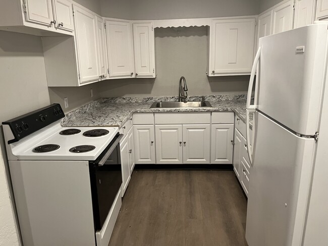Building Photo - The Tiger's Den Apartments