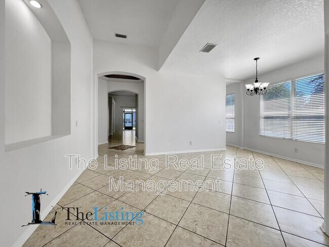 Foto del edificio - 8814 Sandy Plains Dr