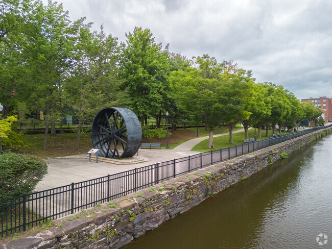 Holyoke Heritage State Park features a playground and sculptures throughout.