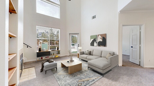 Living Room with Vaulted Ceiling - 6021 Castlegate Dr W Apartment
