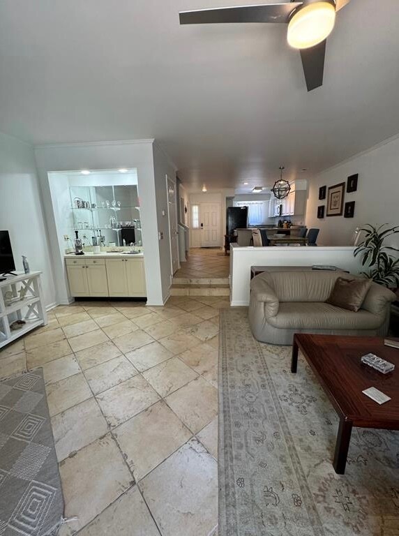 Sunken living room w wet bar/coffee station. - 10027 Washington Cir