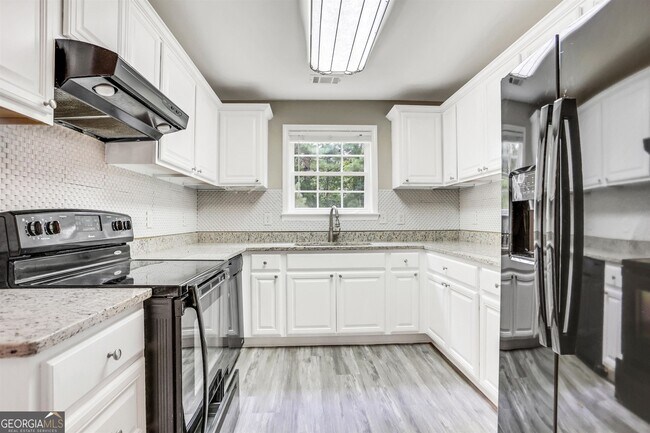 Building Photo - 6390 Ashdale Dr