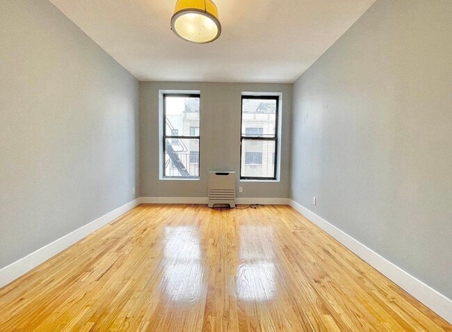 Building Photo - 58 E 130th St