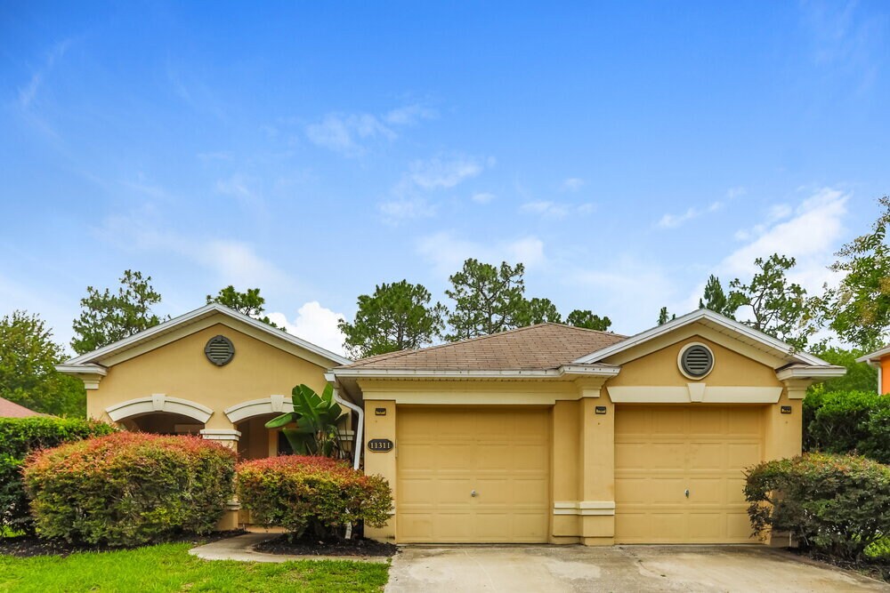 Foto principal - 11311 Justin Oaks Dr N