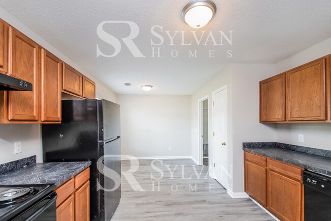 Building Photo - Lease today! No extra charge for contentme...