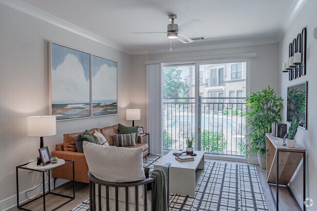 2 habitaciones, 2 baños - 1116 pies cuadrados - Sala de estar - The Lofts at Knightdale Station