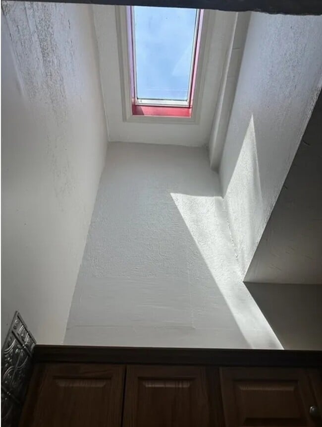 Skylight thru High vaulted ceiling - 65 Manchester St