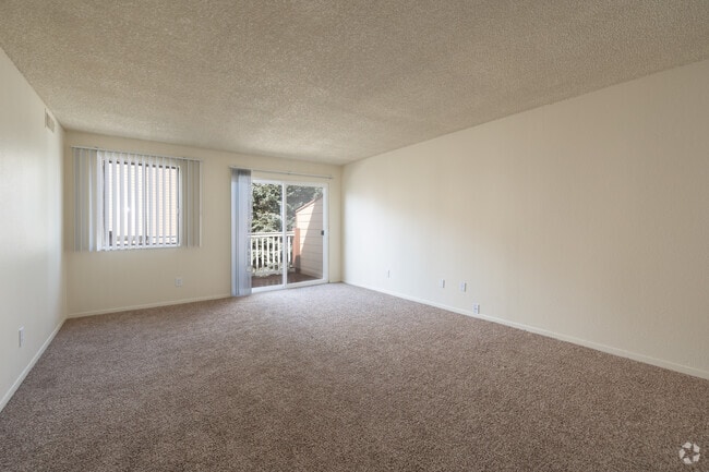 2BR, 2BA - 933SF - Living Room - Candlewood Apartments
