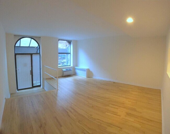 Photo - 201 E 12th St Apartment