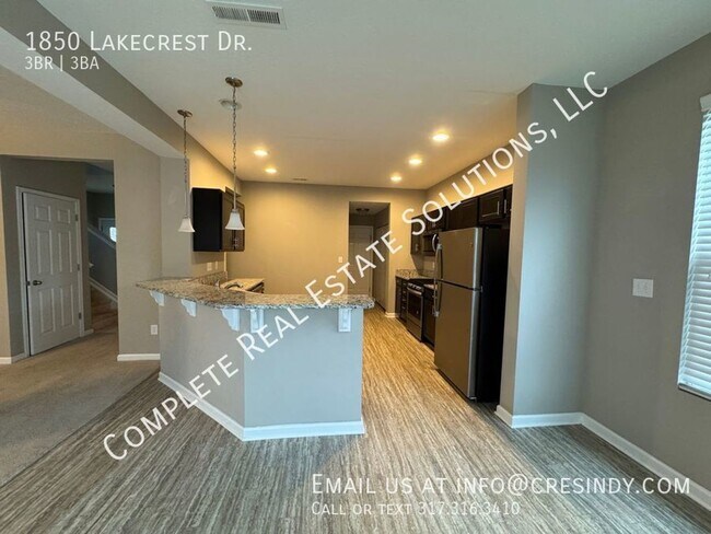 Building Photo - Now Showing this 3BR, 2 1/2 BA home locate...