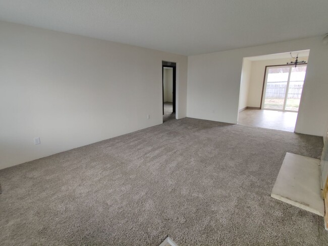 Building Photo - Duplex with garage and fenced yard and upd...