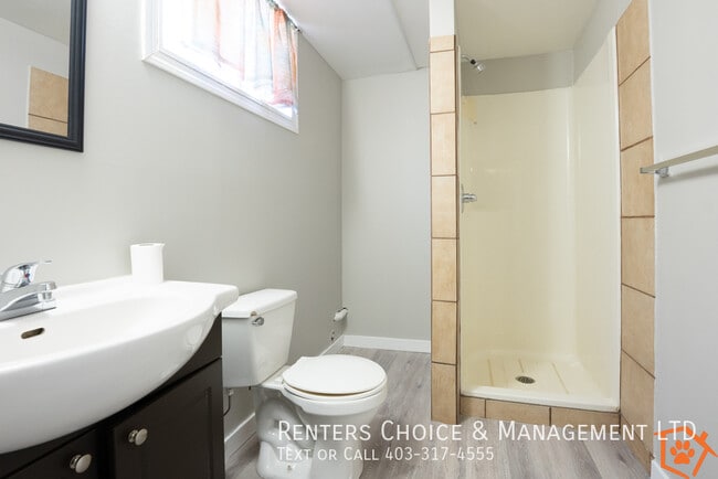 Building Photo - Updated Basement Suite Includes Utilities, Parking + Cat Friendly