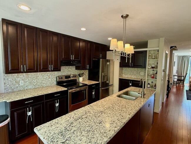 Updated Kitchen with Custom Cabinetry and Built-In Bar! - 960 N Pennsylvania St