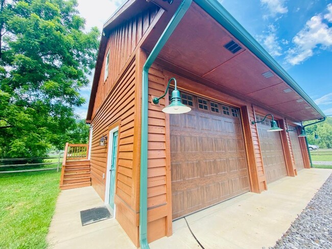 Garage with apartment atop - 7715 NC-16