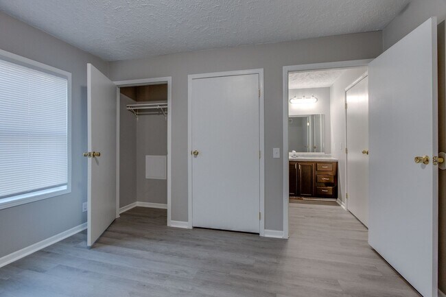 Building Photo - For Rent: Four-Bedroom, Two-Bathroom Available NOW