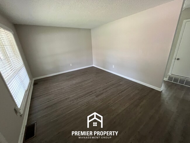 Photo - Spacious 4BR/2BA Home in 38118 | Hardwood Floors & Large Fenced Backyard