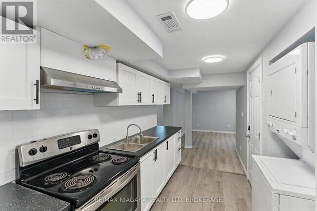 Photo du bâtiment - 290 Scholfield Ave S