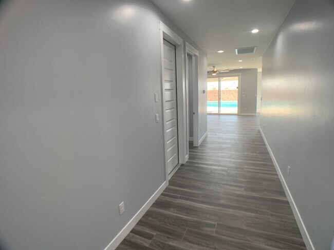 Building Photo - 3 Bedroom - 2 Bath Pool Home