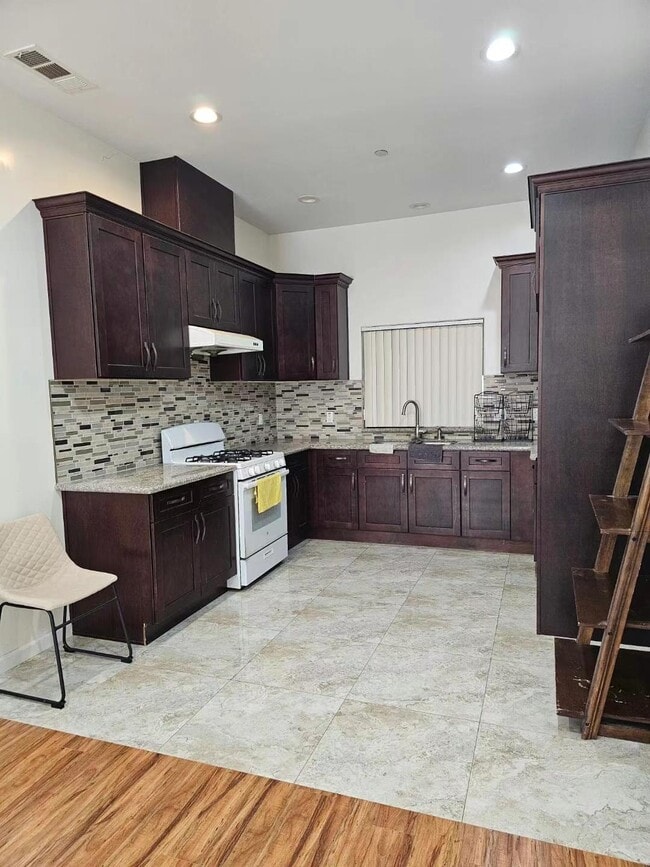 Kitchen **NOTE: the shelf on the right is not included** - 7655 Fern Ave