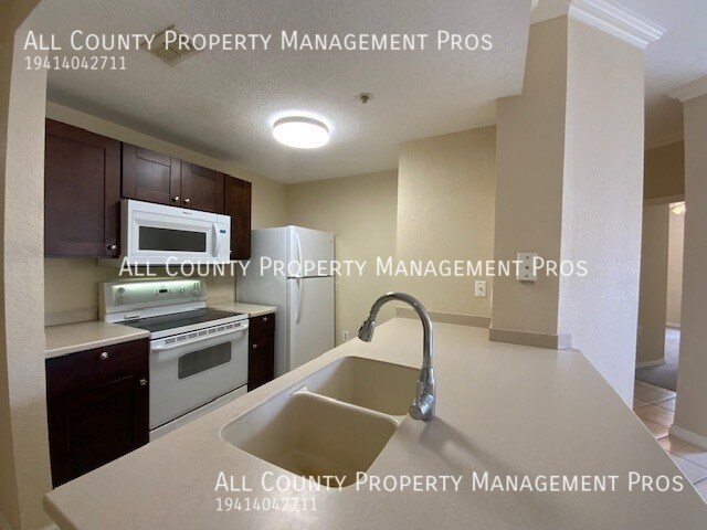 Building Photo - LAS PALMAS, 1ST FLOOR CONDO, CLOSE TO UTC ...
