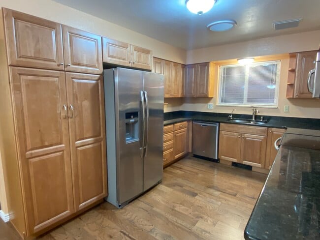 Remodeled Kitchen with stainless appliances and granite counters - 558 W Greenwood Dr