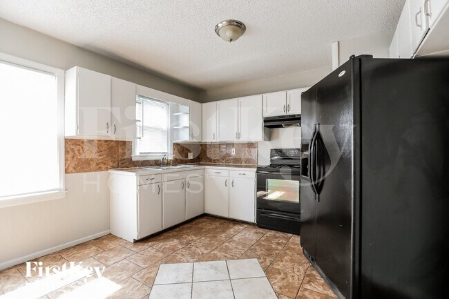 Foto del edificio - 8855 E 59th St