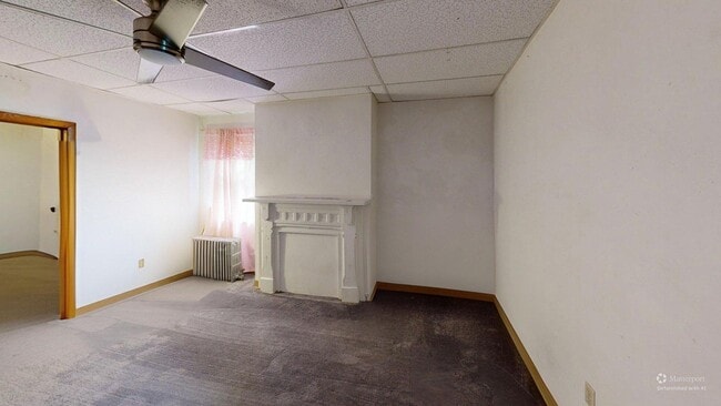 Sala de estar/oficina adicional (planta baja) - 3417 Ward St