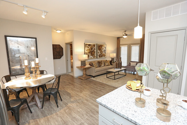 2br, 2ba - 1,285 SF - Dining and Living Room - The Lodges on English Station Road