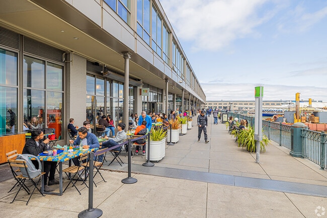 People stop and grab lunch by the water.