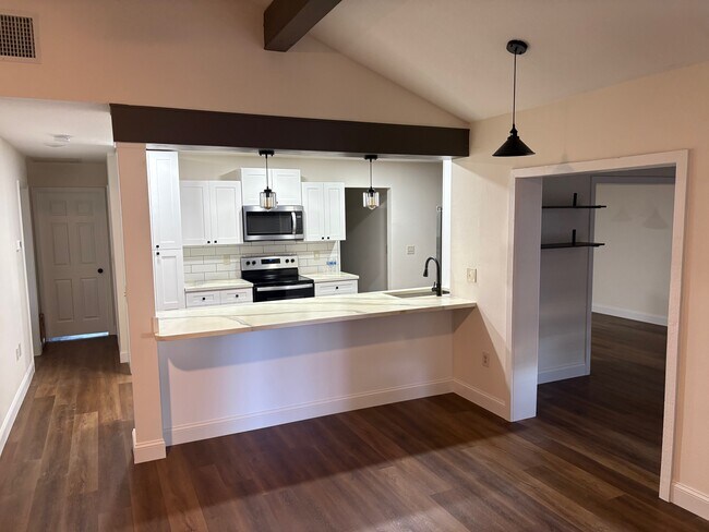 Entry and Kitchen - 316 E Daughtery Rd